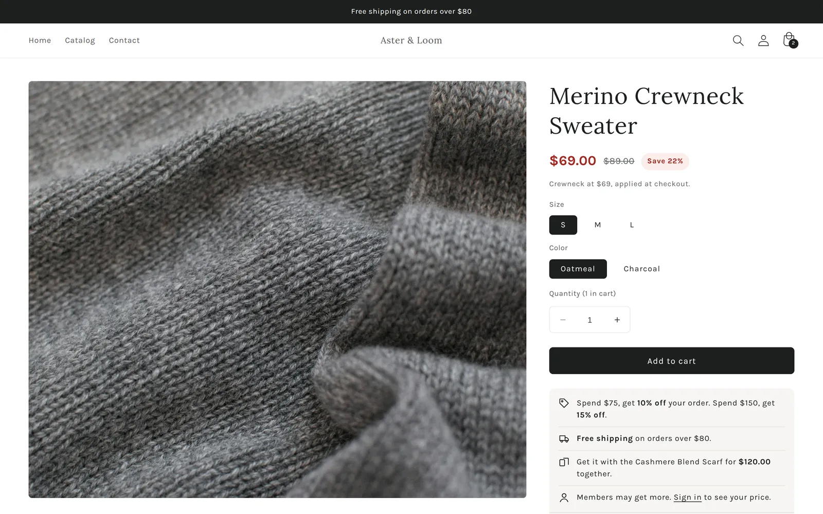 A product page for Merino Crewneck Sweater. Under the title: $69.00 in red, $89.00 struck through and Save 22%, then Crewneck at $69, applied at checkout. Size and colour buttons, quantity and Add to cart. Under the button a light grey box: Spend $75, get 10% off your order. Spend $150, get 15% off. Free shipping on orders over $80. Get it with the Cashmere Blend Scarf for $120.00 together. Members may get more. Sign in to see your price. The top bar reads Free shipping on orders over $80